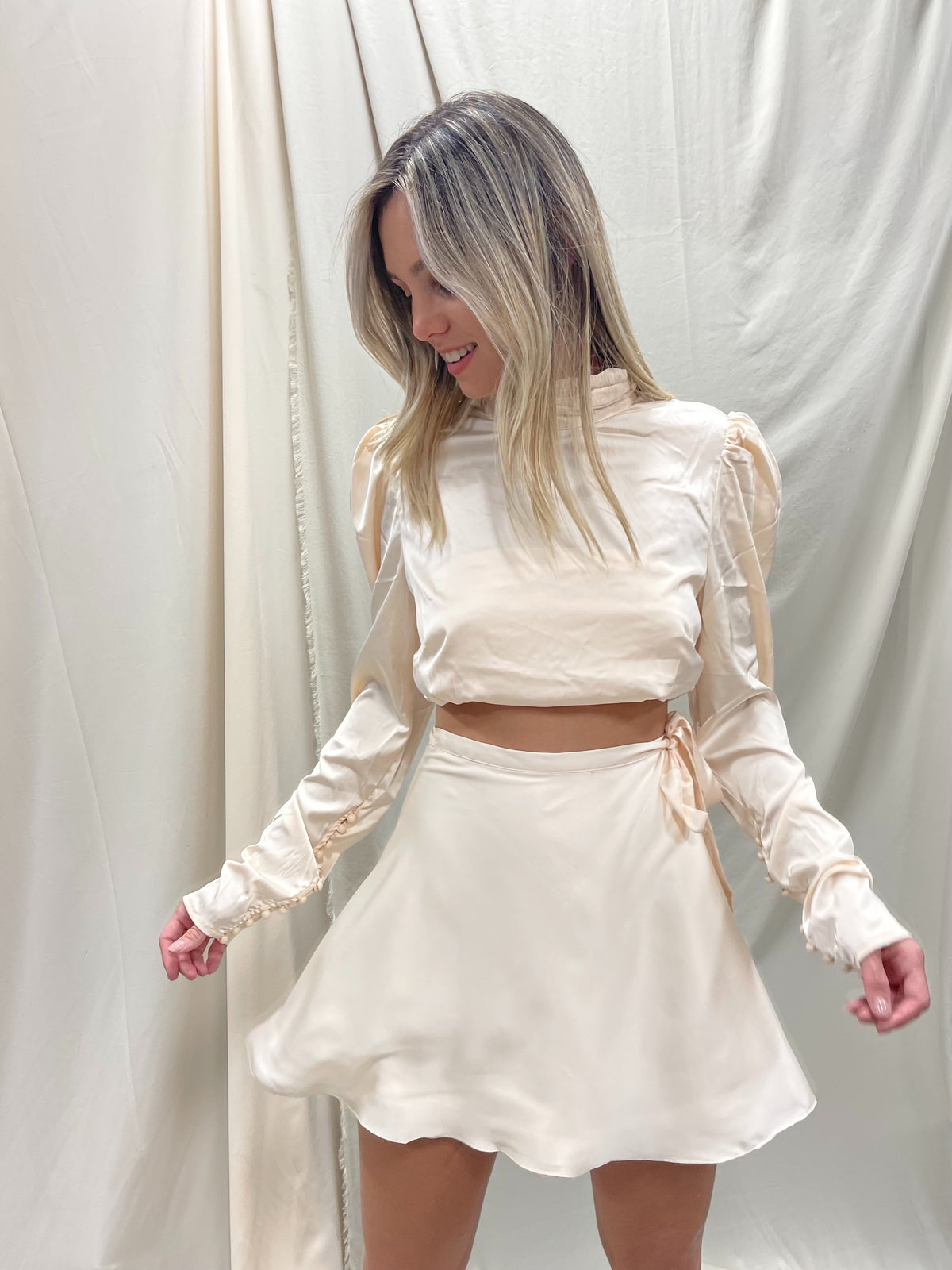 CHAMPAGNE WRAP MINI SKIRT