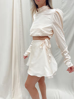 CHAMPAGNE WRAP MINI SKIRT