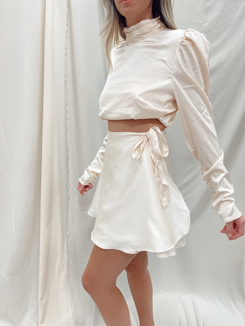 CHAMPAGNE WRAP MINI SKIRT