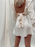 CHAMPAGNE WRAP MINI SKIRT