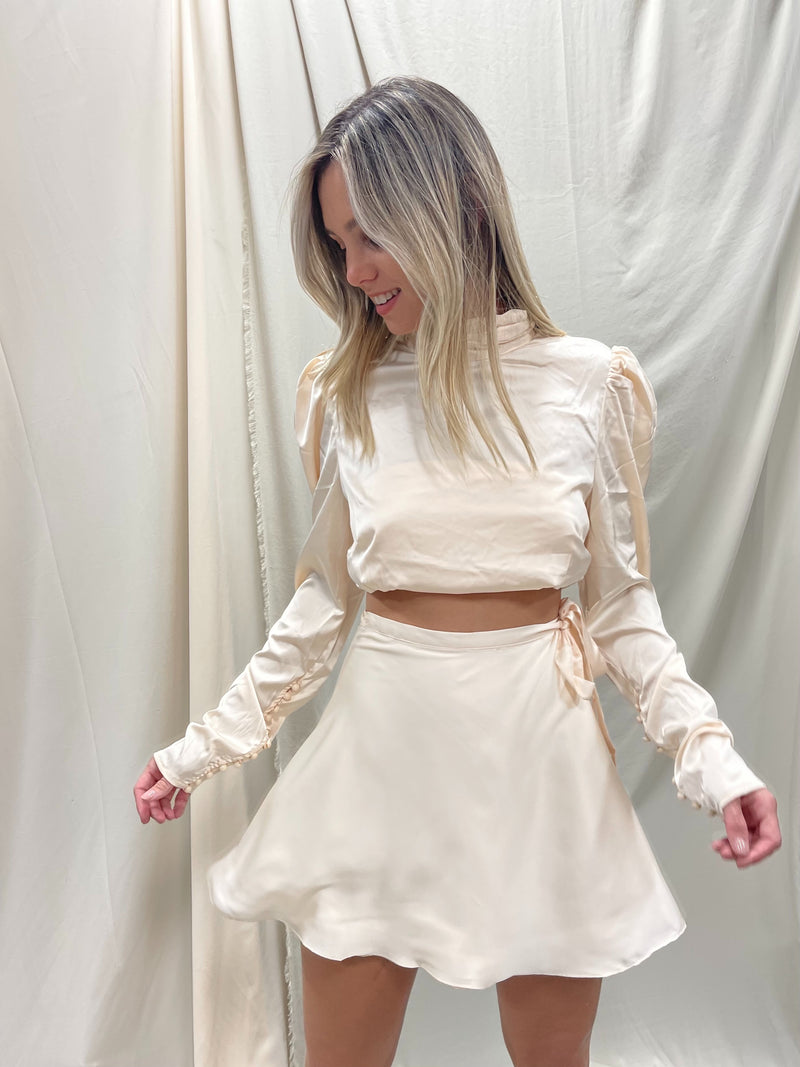 CHAMPAGNE WRAP MINI SKIRT
